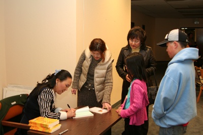 Dr Koo signs her new book