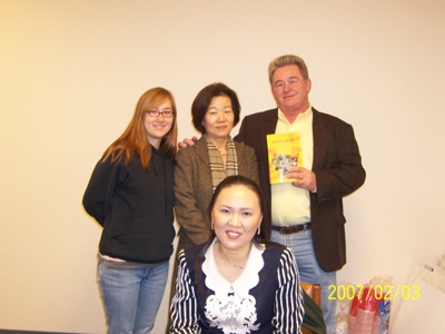 Dr Koo with an Adroit College student and her family